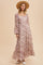 woman wearing a long floral maxi dress with long sleeves and a square neckline, accessorized with a straw hat