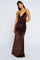 woman wearing a brown leopard print maxi dress with a v-neckline and spaghetti straps