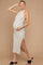 woman wearing a striped maternity dress with a side slit, highlighting her baby bump