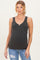 woman wearing a dark gray ribbed maternity tank top with a v-neckline and a fitted style