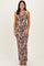 woman wearing a brown tie-dye one-shoulder maxi dress with a matching neck scarf