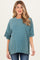 woman wearing a teal oversized maternity t-shirt with short sleeves and a relaxed fit