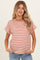 woman wearing a rust and cream striped maternity top with rolled sleeves and casual fit