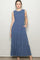 woman wearing a blue sleeveless maxi dress with tiered ruffles and pockets