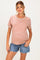 woman wearing a beige and red striped maternity t-shirt with puffy sleeves and blue denim shorts, showing her baby bump