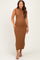 woman wearing a ribbed brown maternity dress with a sleeveless design and a fitted silhouette, showing her baby bump