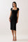 woman wearing a black ribbed midi dress with a square neckline and short sleeves