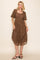 woman wearing a brown lace midi dress with short sleeves and a square neckline