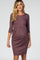 woman wearing a mauve 3/4 sleeve maternity dress with a pleated front and baby bump visible