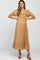 woman wearing a mustard floral print maternity dress with flutter sleeves and a ruffled hem, showing her baby bump