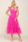woman wearing a bright pink tiered tulle dress with ruffle sleeves and a square neckline