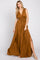 Woman wearing a sleeveless bronze satin maxi dress with a drawstring waist and side slit