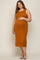 Pregnant woman wearing a sleeveless burnt orange ribbed maternity midi dress with side slit