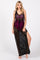 woman wearing a black and pink maxi cover-up with a sheer design and side slit