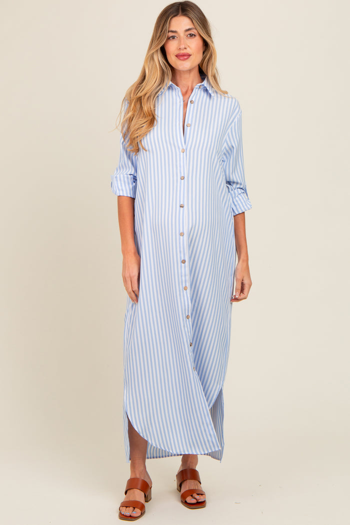 woman wearing a light blue and white striped maternity maxi dress with button front and rolled sleeves