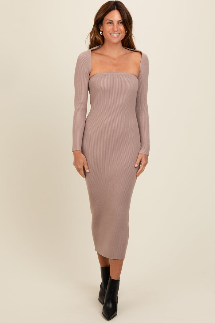 woman wearing a ribbed mauve midi dress with long sleeves and a square neckline in front of a neutral background