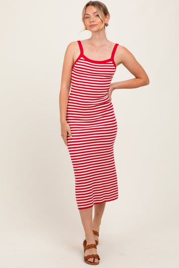 woman wearing a red and white striped midi dress with spaghetti straps