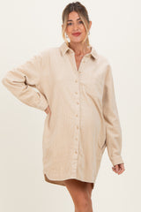 woman wearing a beige corduroy maternity shirt dress with a collar and button-down front, showing her baby bump