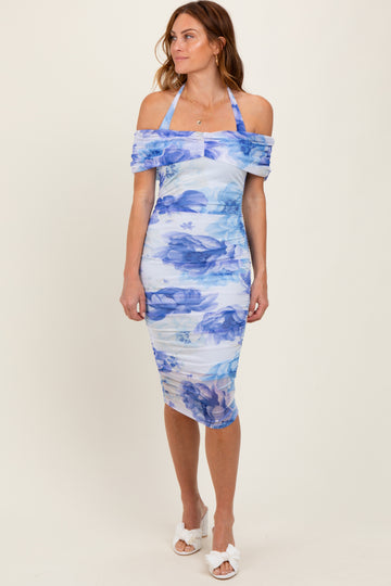 woman wearing a light blue off-the-shoulder floral bodycon dress with a fitted silhouette