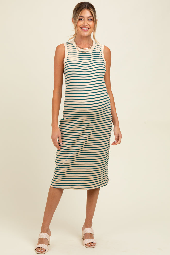 woman wearing a striped maternity midi dress with a fitted silhouette and a round neckline, showcasing her baby bump