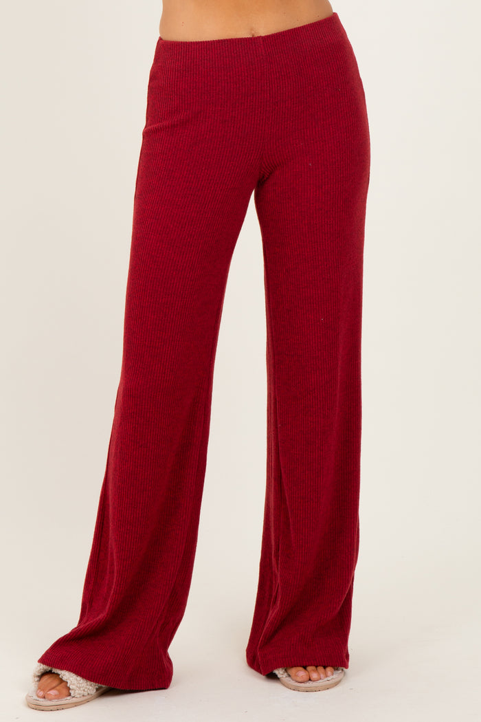 woman wearing burgundy ribbed wide-leg pants