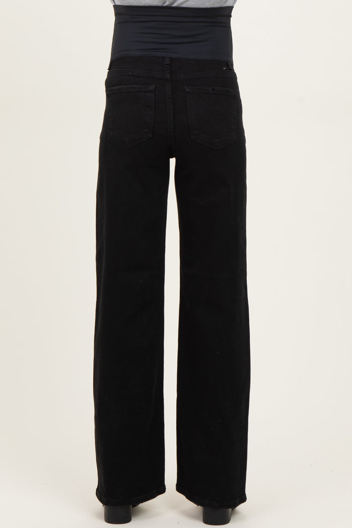 maternity wear black wide-leg jeans with a stretchy belly panel, shown from the back