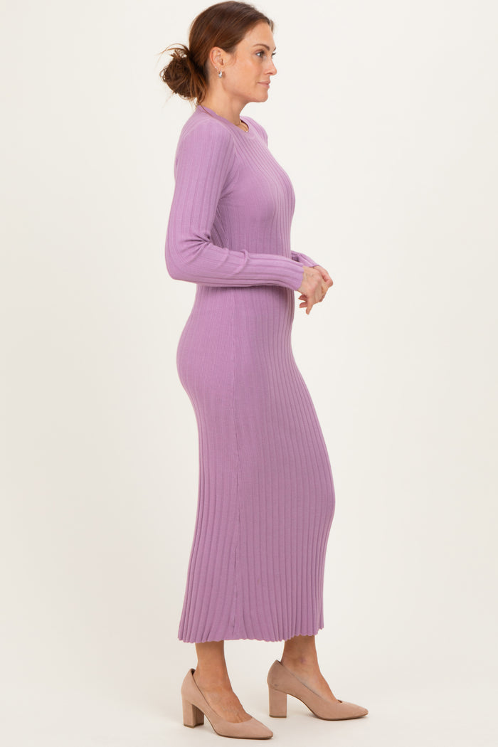 woman wearing a long sleeve ribbed lavender maxi dress and beige heels
