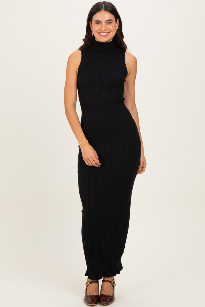 woman wearing a black ribbed sleeveless maxi dress with a turtleneck and fitted silhouette