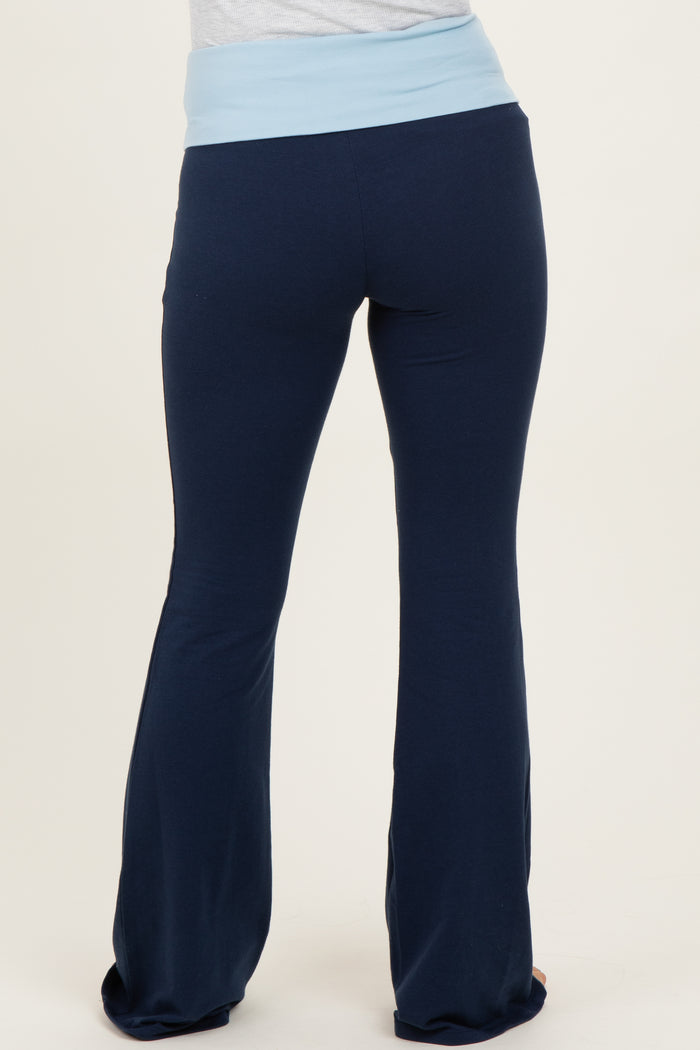 maternity wear navy blue flare pants with a light blue waistband, model shown from the back
