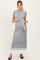 woman wearing a grey ribbed maternity dress with a white tie belt and a baby bump visible