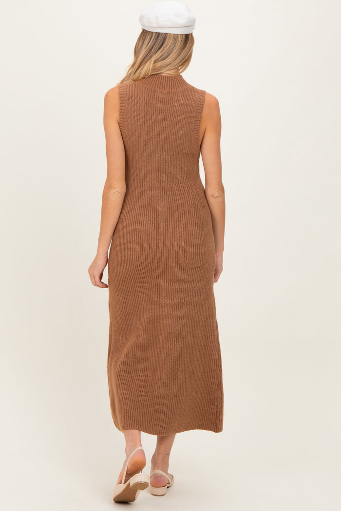 woman wearing a ribbed brown sleeveless maternity maxi dress, showing a pregnant belly from the back