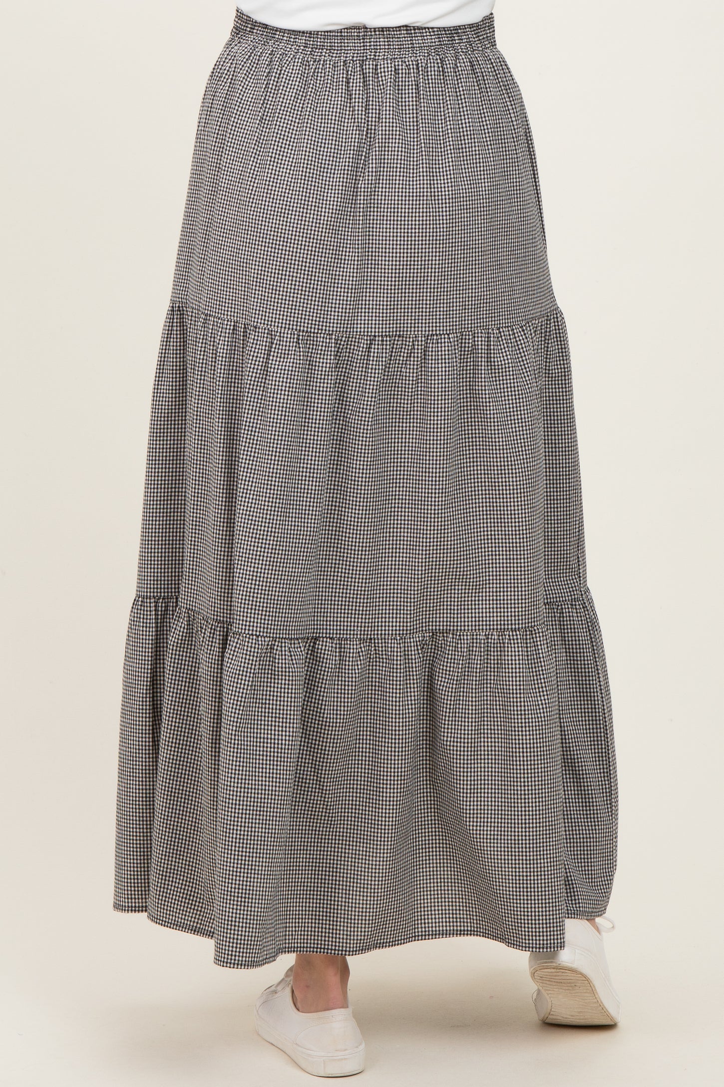 maternity wear black and white checkered tiered maxi skirt with elastic waistband, shown from the back