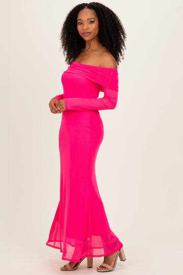 woman wearing a bright pink off-the-shoulder long sleeve gown with a mermaid hemline and a fitted silhouette