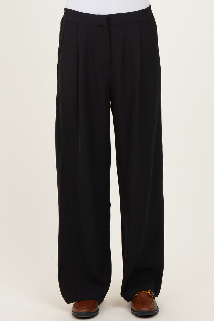 black wide-leg women's trousers with front pleats and a relaxed fit