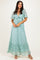woman wearing a light teal lace maxi dress with flutter sleeves and a tie front detail