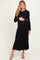 woman wearing a black ribbed long sleeve maternity dress and holding her baby bump