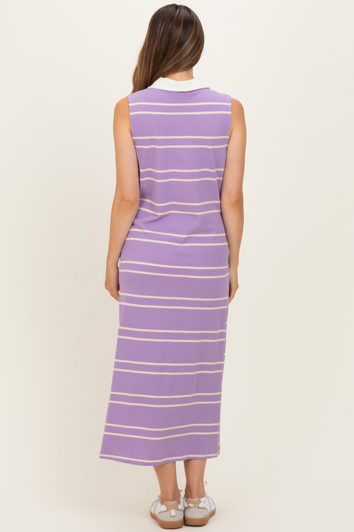 woman wearing a purple striped sleeveless maternity dress, showing a relaxed fit and ankle-length design from the back