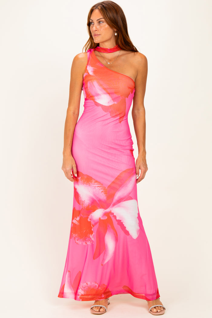 woman wearing a pink floral one-shoulder maxi dress with a fitted silhouette and a matching choker necklace