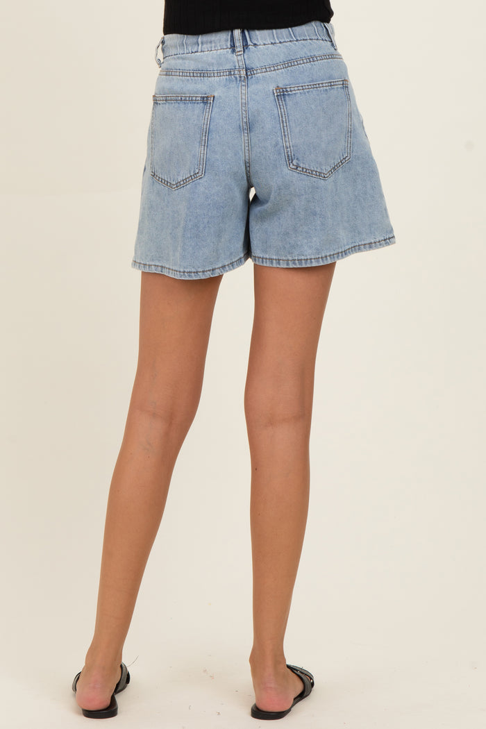 maternity wear light blue denim shorts with an elastic waistband, model shown from the back