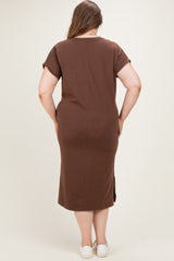 woman wearing a brown maternity plus midi dress with short sleeves and side slits, viewed from the back