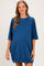 woman wearing a navy blue maternity dress with short sleeves and a relaxed fit, showcasing a baby bump