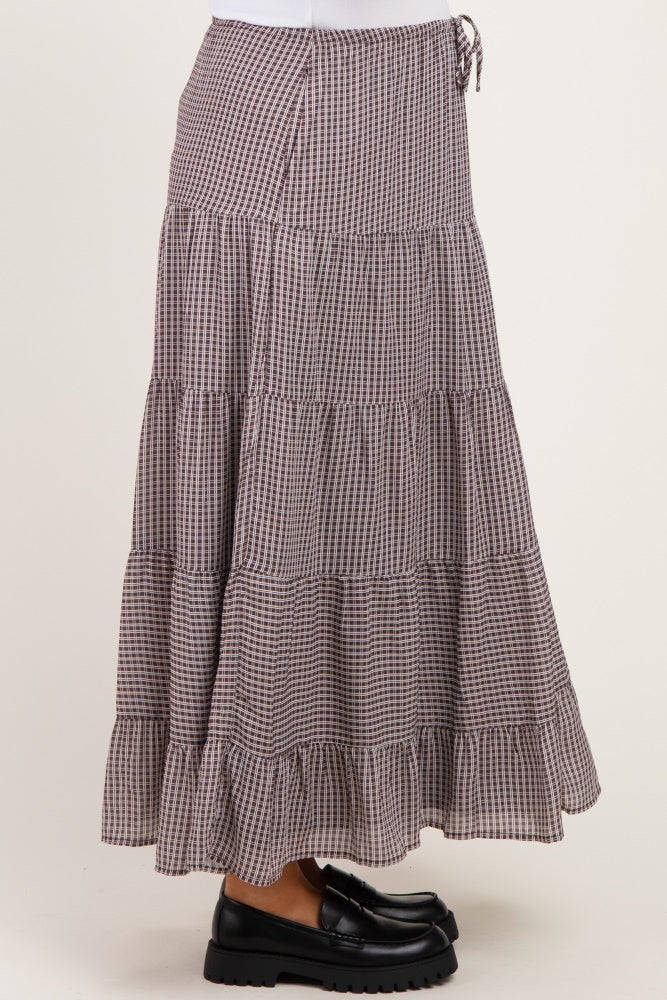 maternity wear brown and white tiered maxi skirt with ruffled hem and drawstring detail, model wearing black shoes