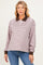 woman wearing a pink and brown striped maternity polo sweatshirt with a collar and long sleeves