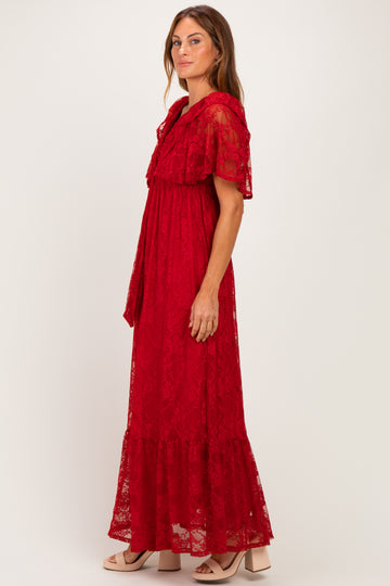 woman wearing a red lace maxi dress with short sleeves and a ruffled hem