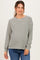woman wearing a striped maternity long sleeve top with relaxed fit and cozy style, highlighting her baby bump