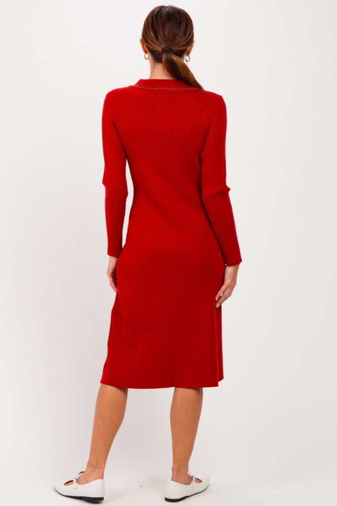 woman wearing a red ribbed long sleeve midi dress, seen from the back