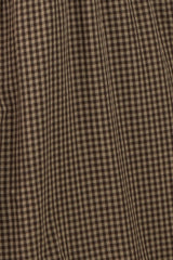 brown and beige gingham plaid fabric with a textured surface