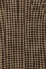 maternity wear in a brown and beige gingham pattern with a loose, flowing fit