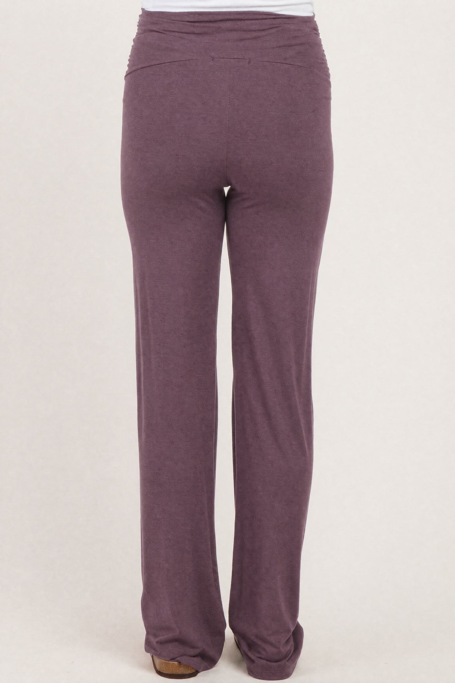 maternity wear in a plum color with ruched detailing at the back, shown from the back view