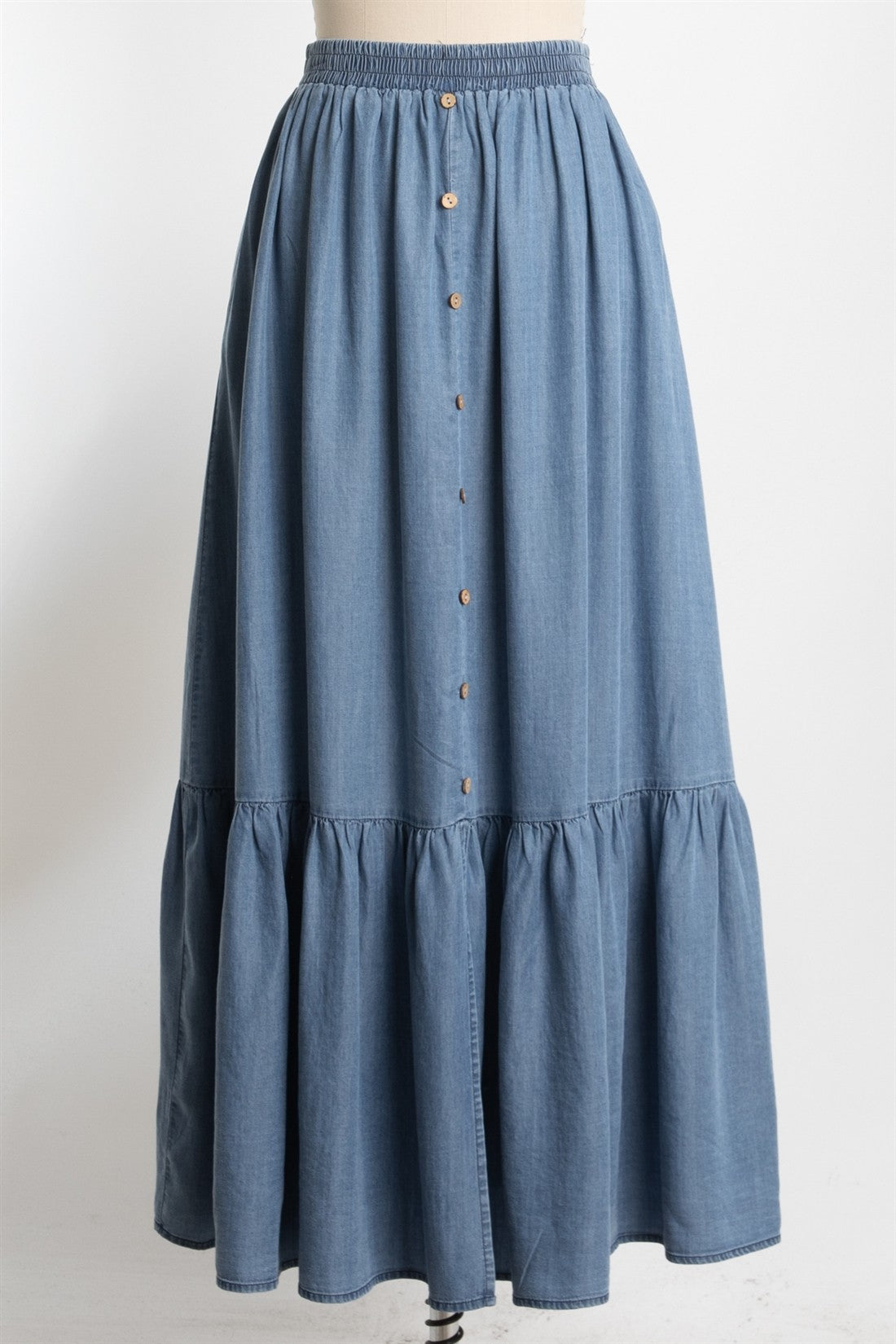 blue denim maxi skirt with a tiered hem and button detail down the front